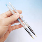 two paintbrushes