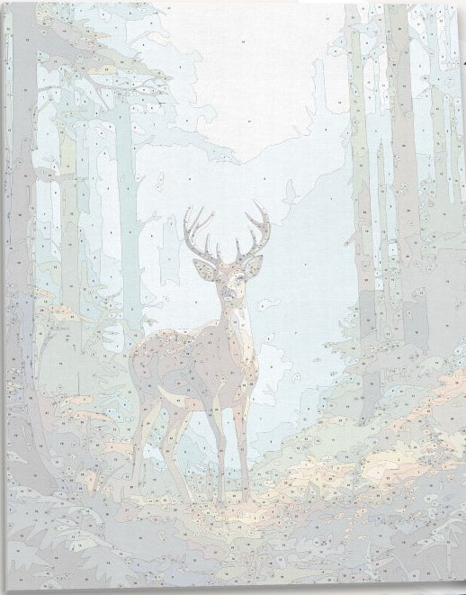 In the image, a majestic deer stands tall amidst a serene forest.
